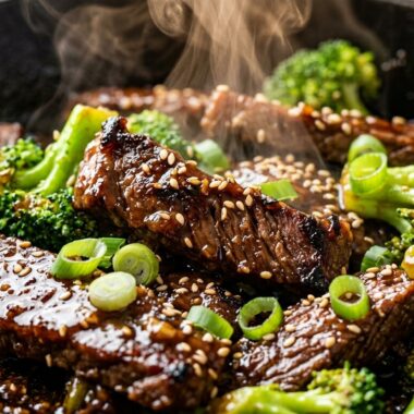 Tender beef teriyaki strips and crisp broccoli simmering in sweet garlic ginger glaze with sesame seeds